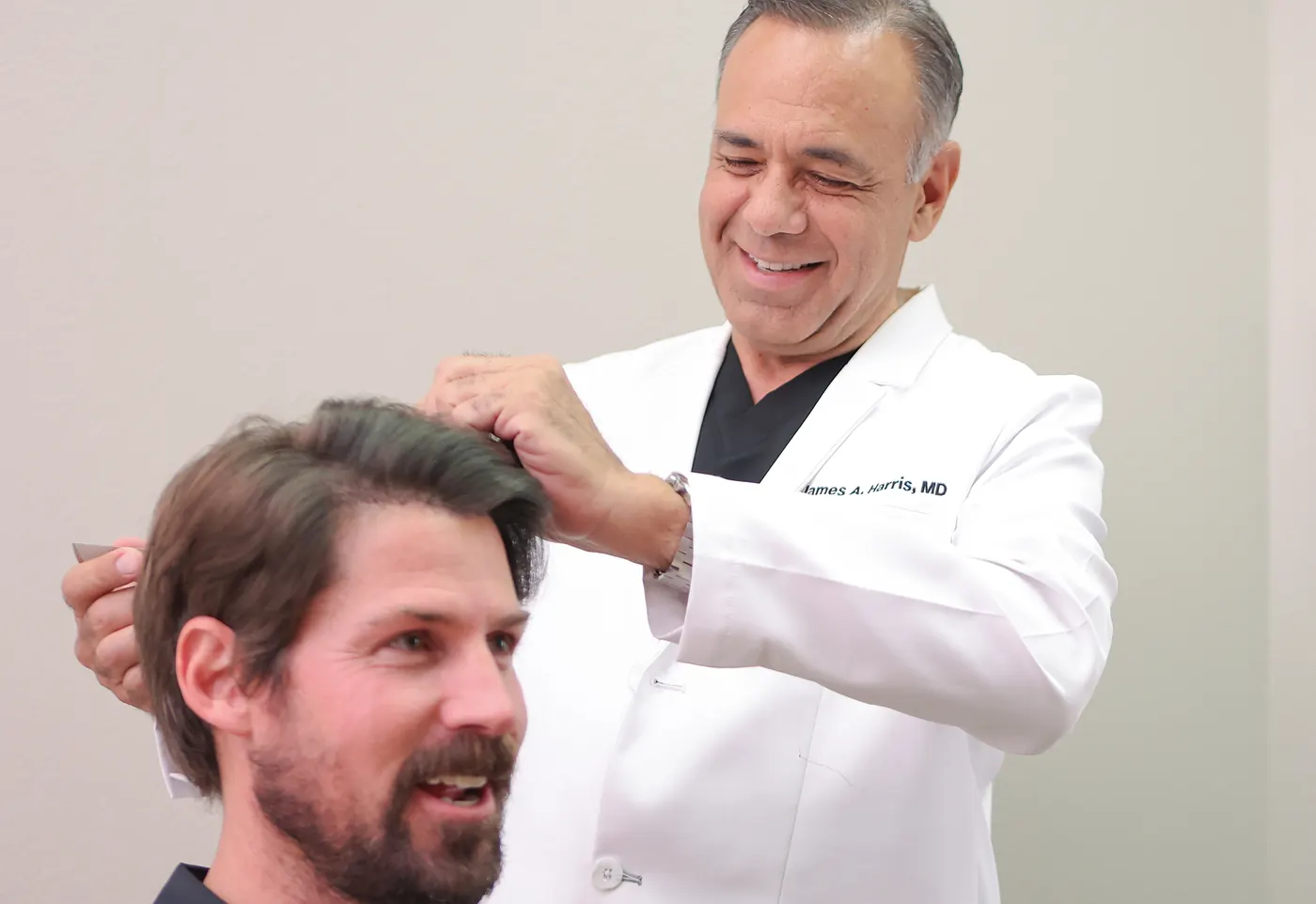 Dr. Harris consulting with a RESTORE client